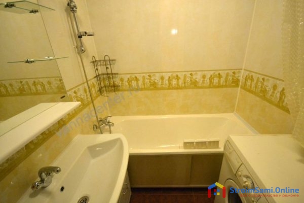 На фото: отделка стен в ванной панелями ПВХ